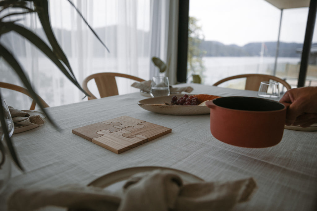 Puslebrikke-bordbeskyttere satt sammen til større beskytter