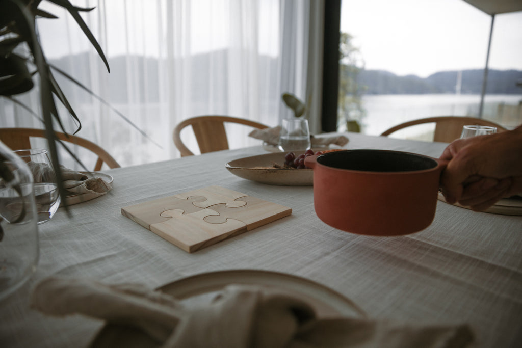 Bordbeskytter under varm gryte